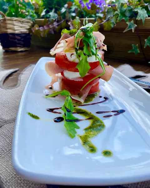 A tomato and mozzarella caprese tower