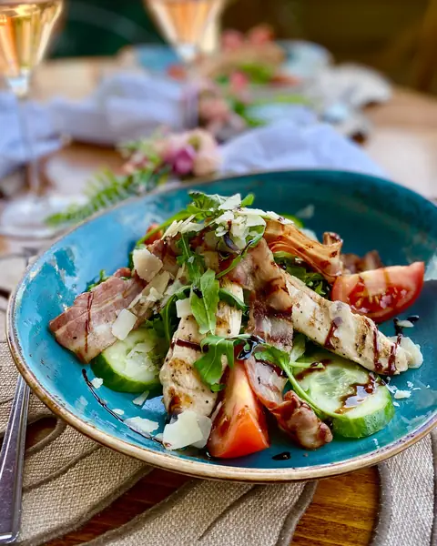 Chicken salad on a blue plate