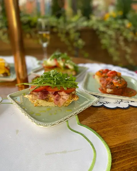 Plates of eggs and salads on a garden table